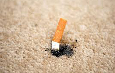سوختگی فرش با سیگار